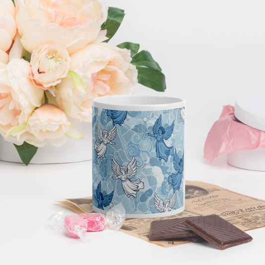 "Light blue and white ceramic mug with modern design, perfect for coffee and tea lovers"